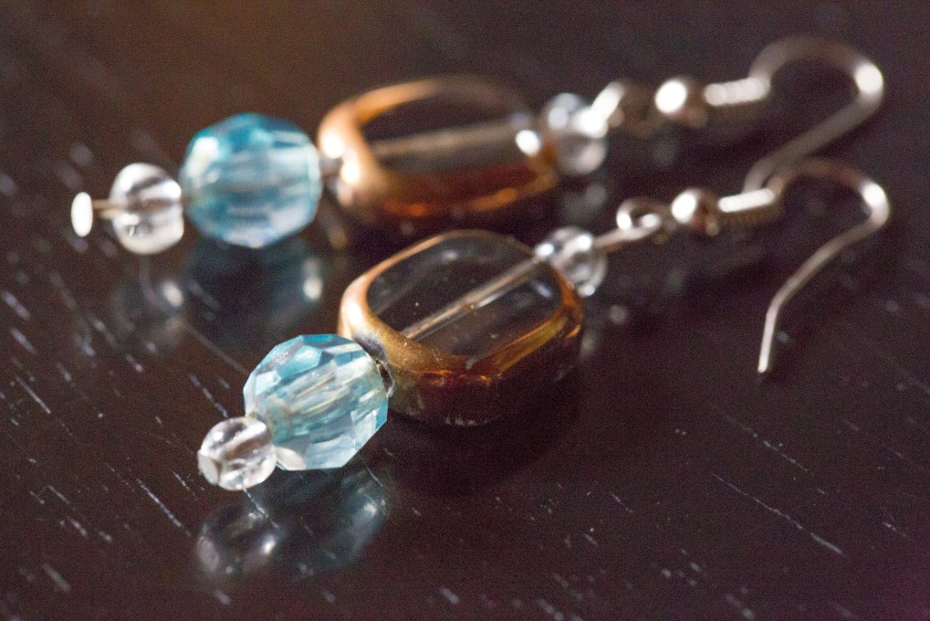 My Earrings. Purchased from a young cloth weaver, storekeeper. Antigua, Guatemala